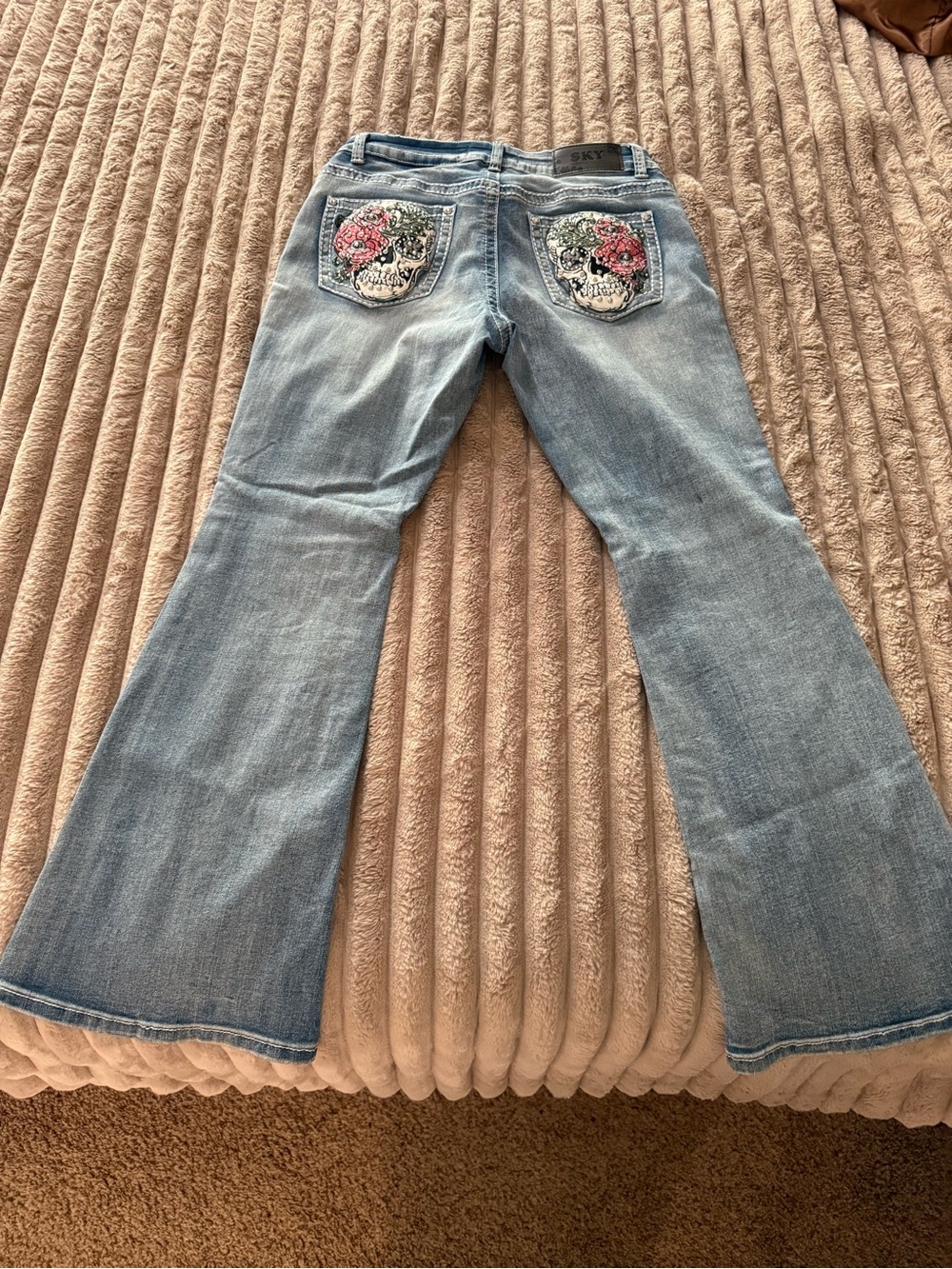 Sky Light Blue Flare Jeans with Embroidered Skull Pockets